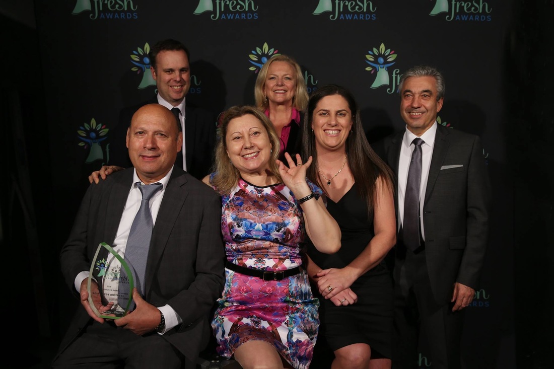 Greengrocer - Best Large Business winner - Fruitezy Marketplace (Miranda) (L-R front) Abilio and Alzira Pavia, Lisa Perstrelo. (L-R back row) Clinton Maynard, Lyndey Milan and Max Filipe.
