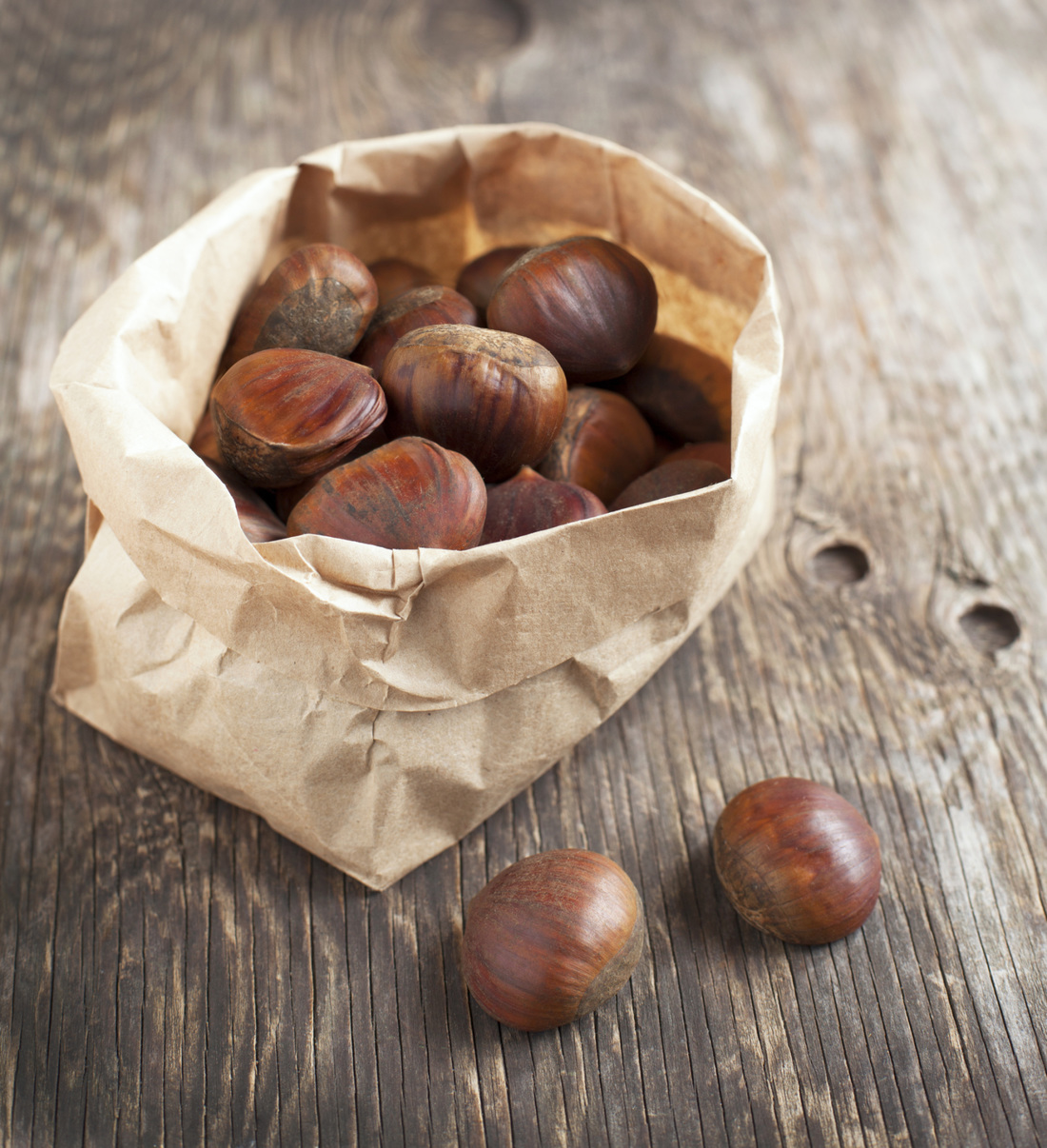 Chestnuts in a brown paper bag