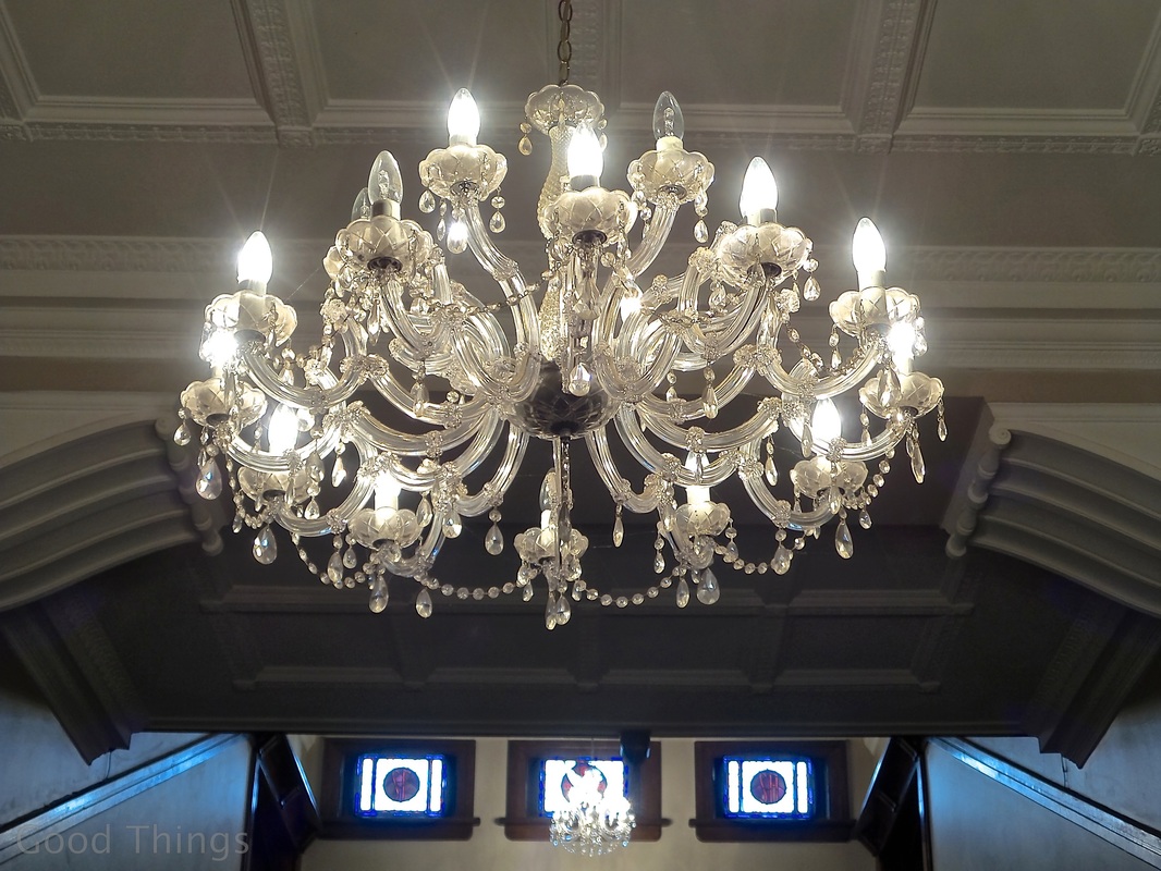 The chandelier over the main staircase at The Robertson Hotel