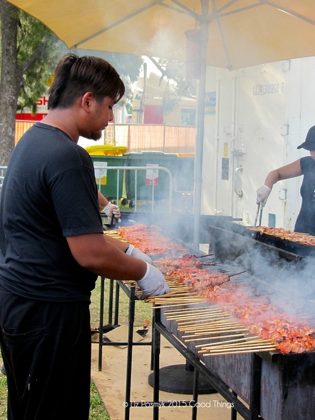 Smoke rises from the bbq at the Hoy Pinoy stand 