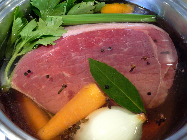 Corned beef simmering in the pot