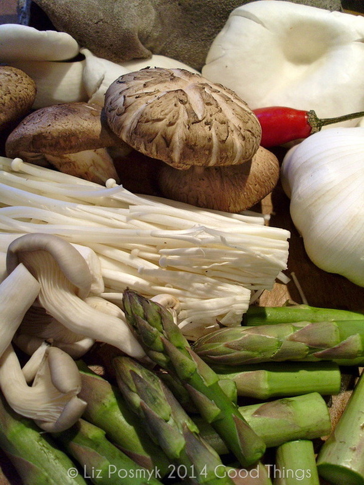 Fresh asparagus with chillies and a selection of Asian mushrooms