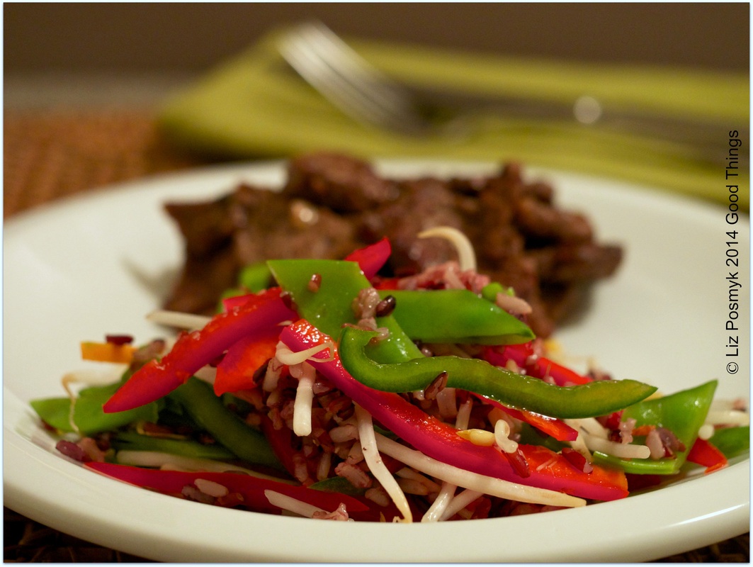 Shaking beef with wild rice, snow pea and bell pepper salad