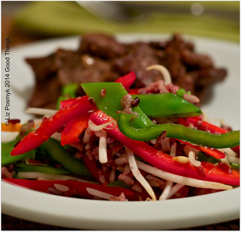 Shaking beef with wild rice, snow pea and bell pepper salad