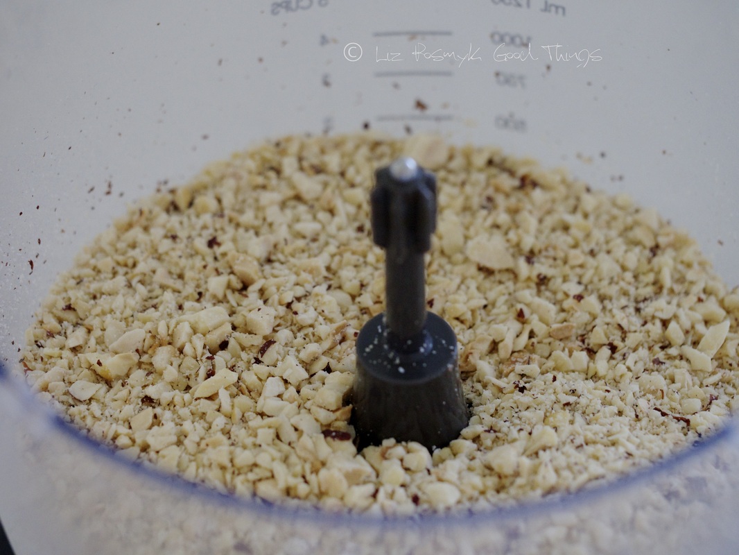 Grind the hazelnuts to a coarse meal