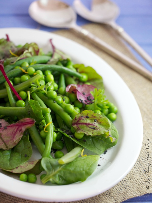 Beans and peas with baby chard and spinach leaves