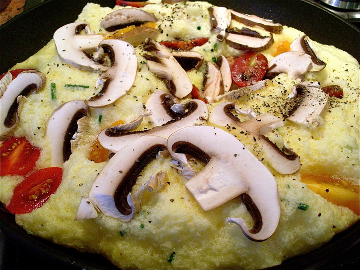 An open faced souffle omelette