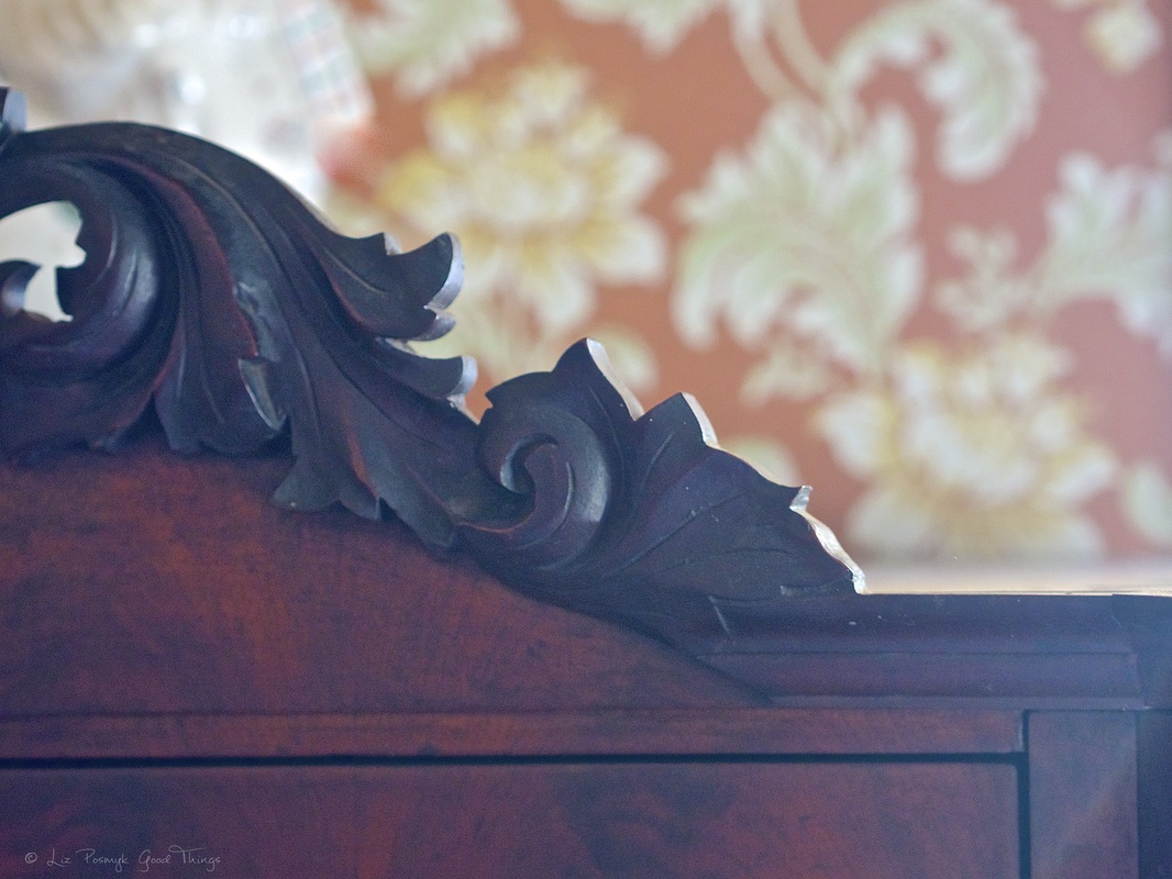 Ornately carved furniture against wallpaper at Cooma Cottage - Liz Posmyk Good Things 
