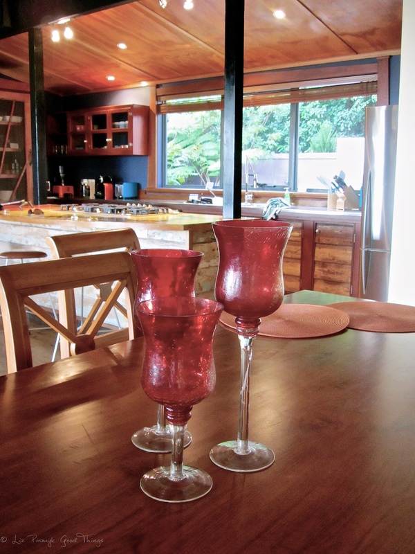 The dining table looking to the kitchen at Sahali in the Kangaroo Valley NSW