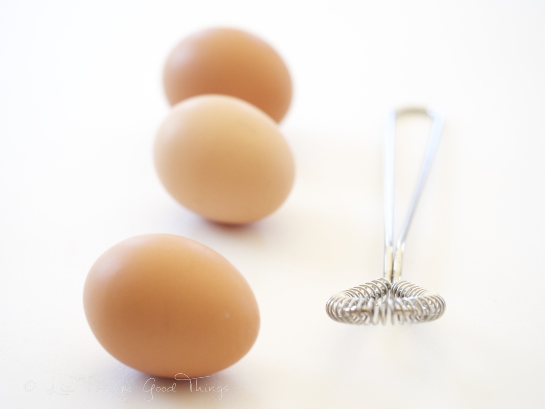 Eggs and whisk by Liz Posmyk