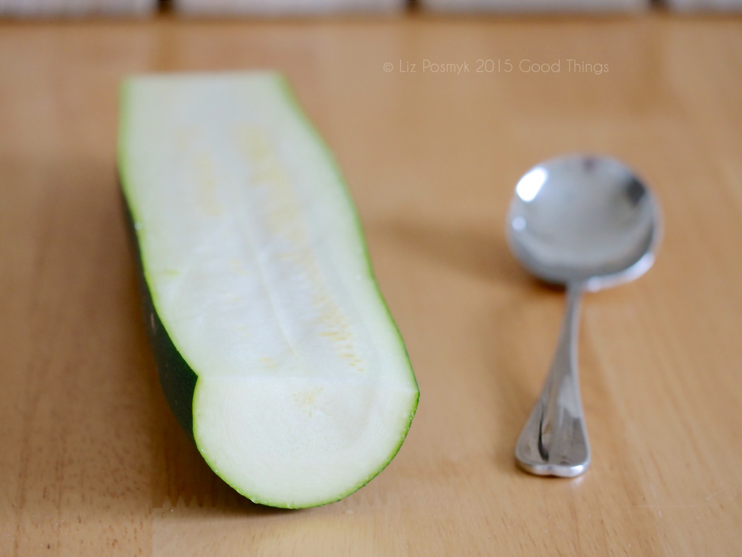 Core the zucchini with a soup spoon