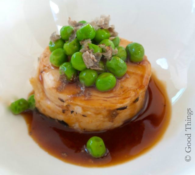 Rolled chicken with truffle jus and garden peas