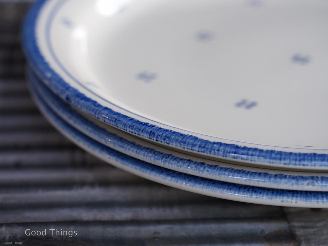 Stack of three blue and white dinner plates Liz Posmyk Good Things
